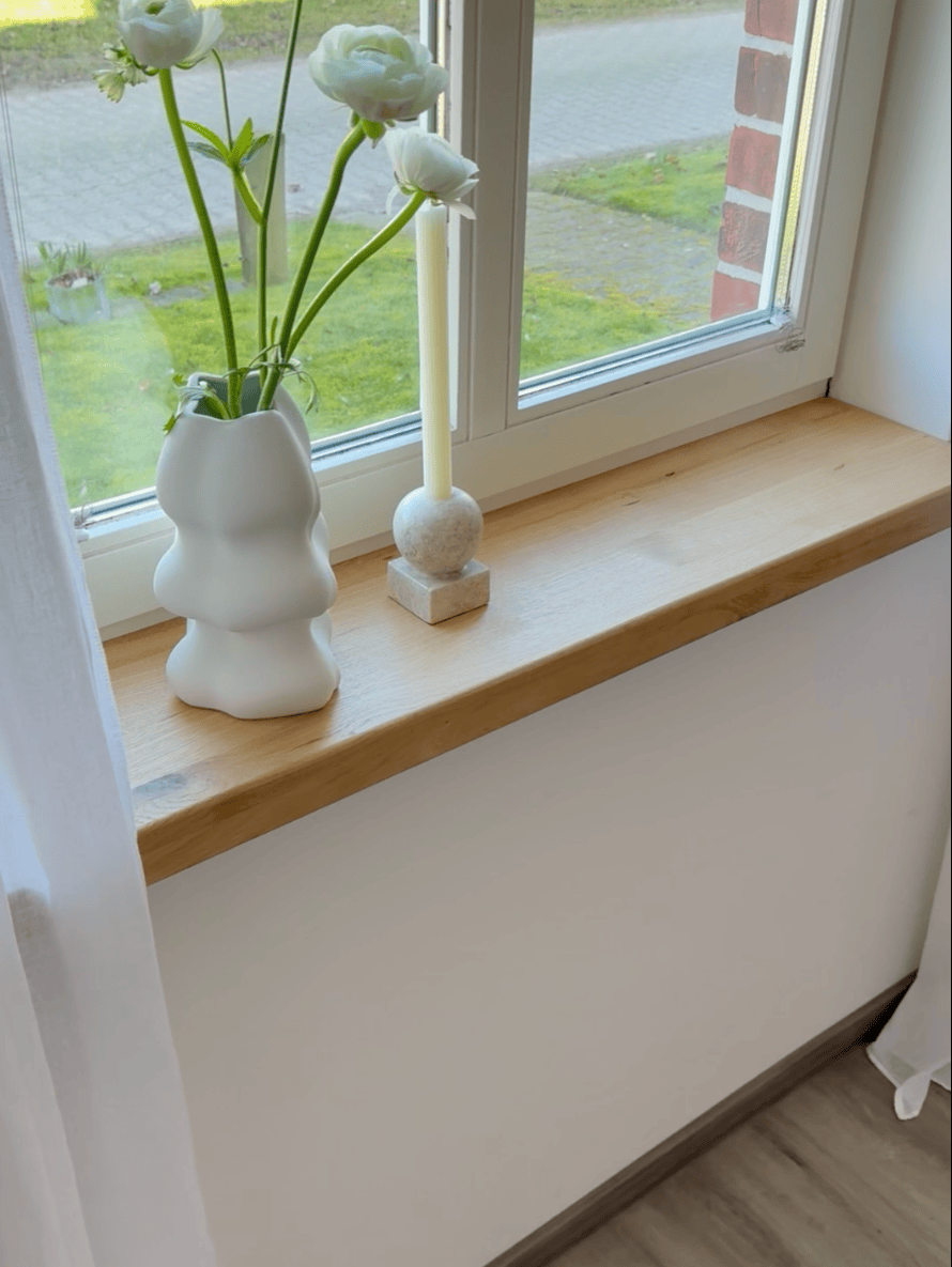 Alte-Fensterbank-nach-Renovierung-mit-Aufsatzfensterbank